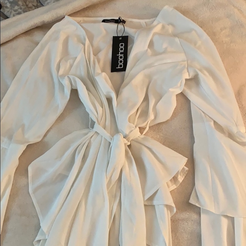Tie waist frill sleeve wrap blouse